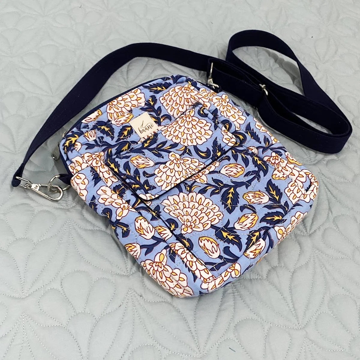 Freesia Sling: Vertical Quilted Sling Bag: Yellow Blue Flowers on Blue