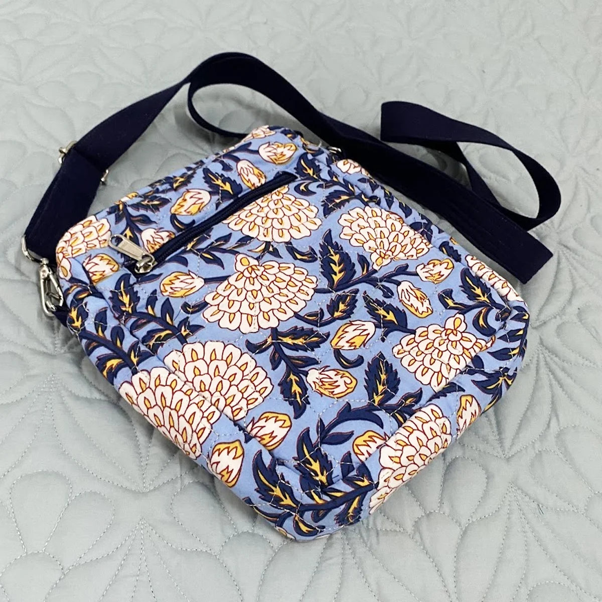 Freesia Sling: Vertical Quilted Sling Bag: Yellow Blue Flowers on Blue