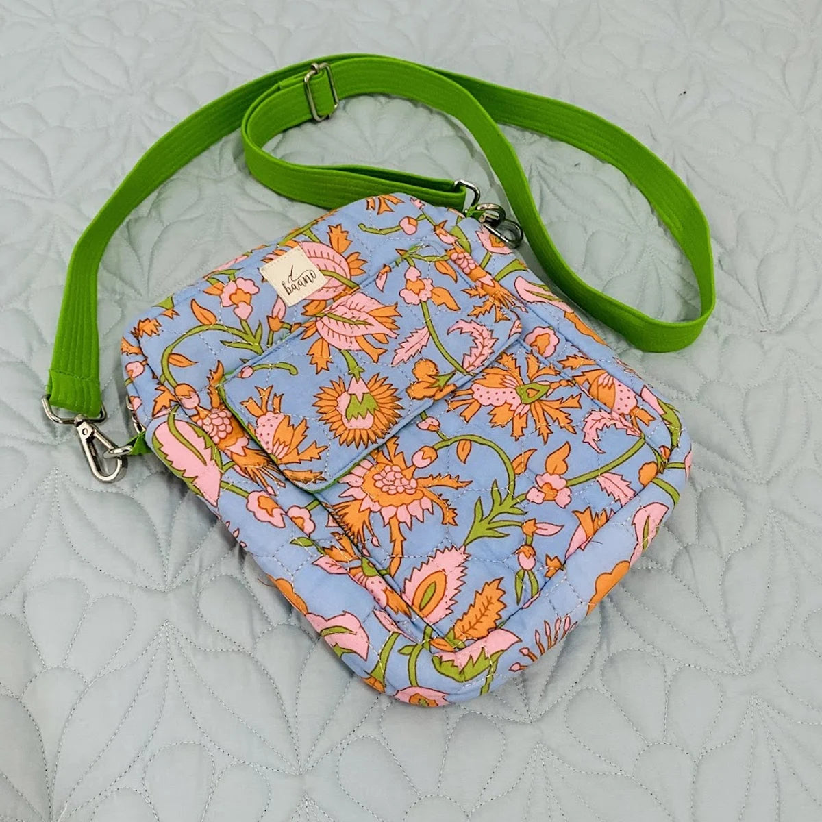 Freesia Sling: Vertical Quilted Sling Bag: Orange Flowers on Blue