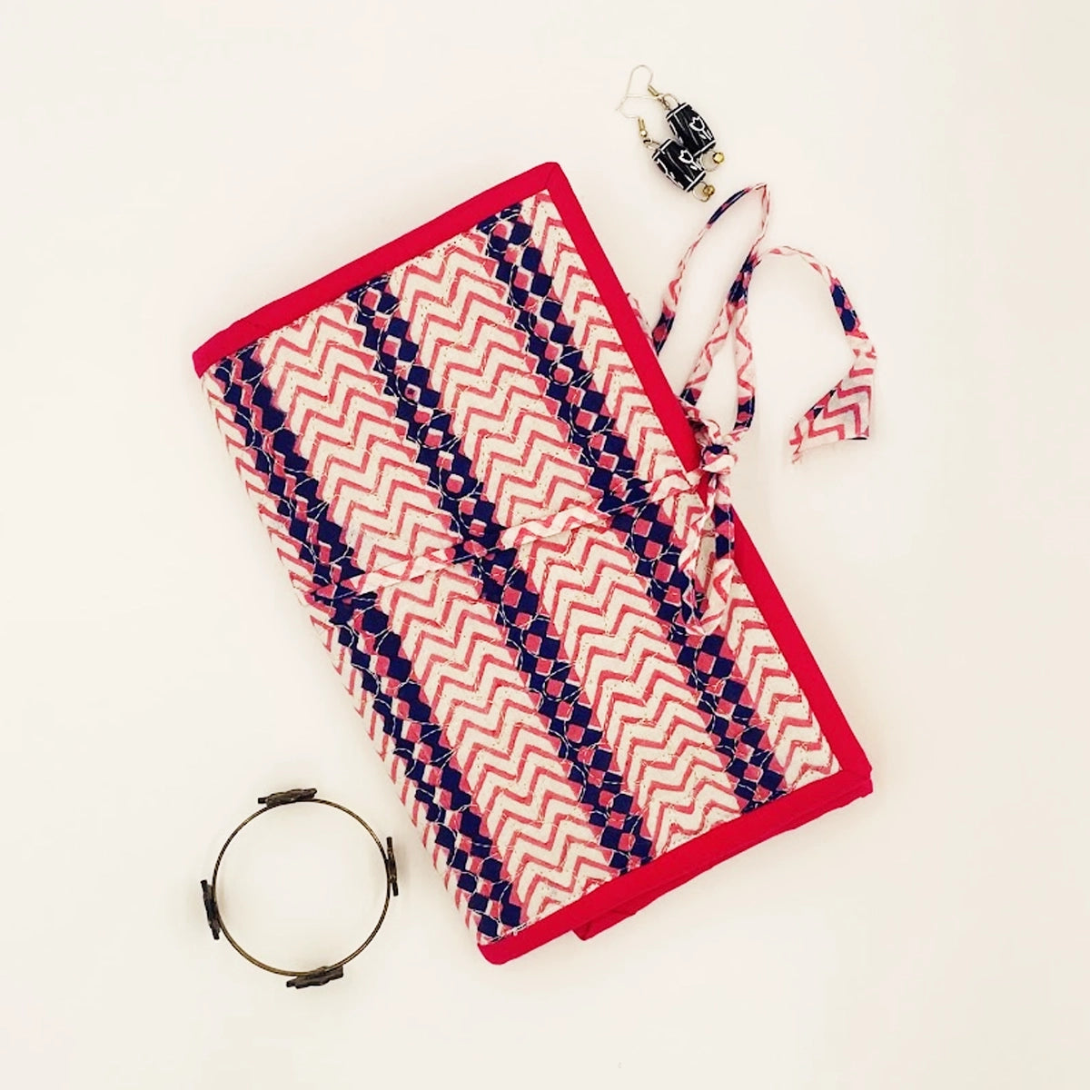 Buttercup Jewellery Pouch: Blue Pink Geometric