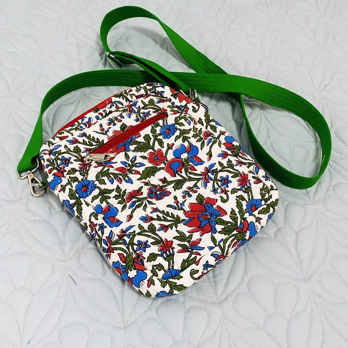 Freesia Sling: Vertical Quilted Sling Bag: Red Blue Flowers on White