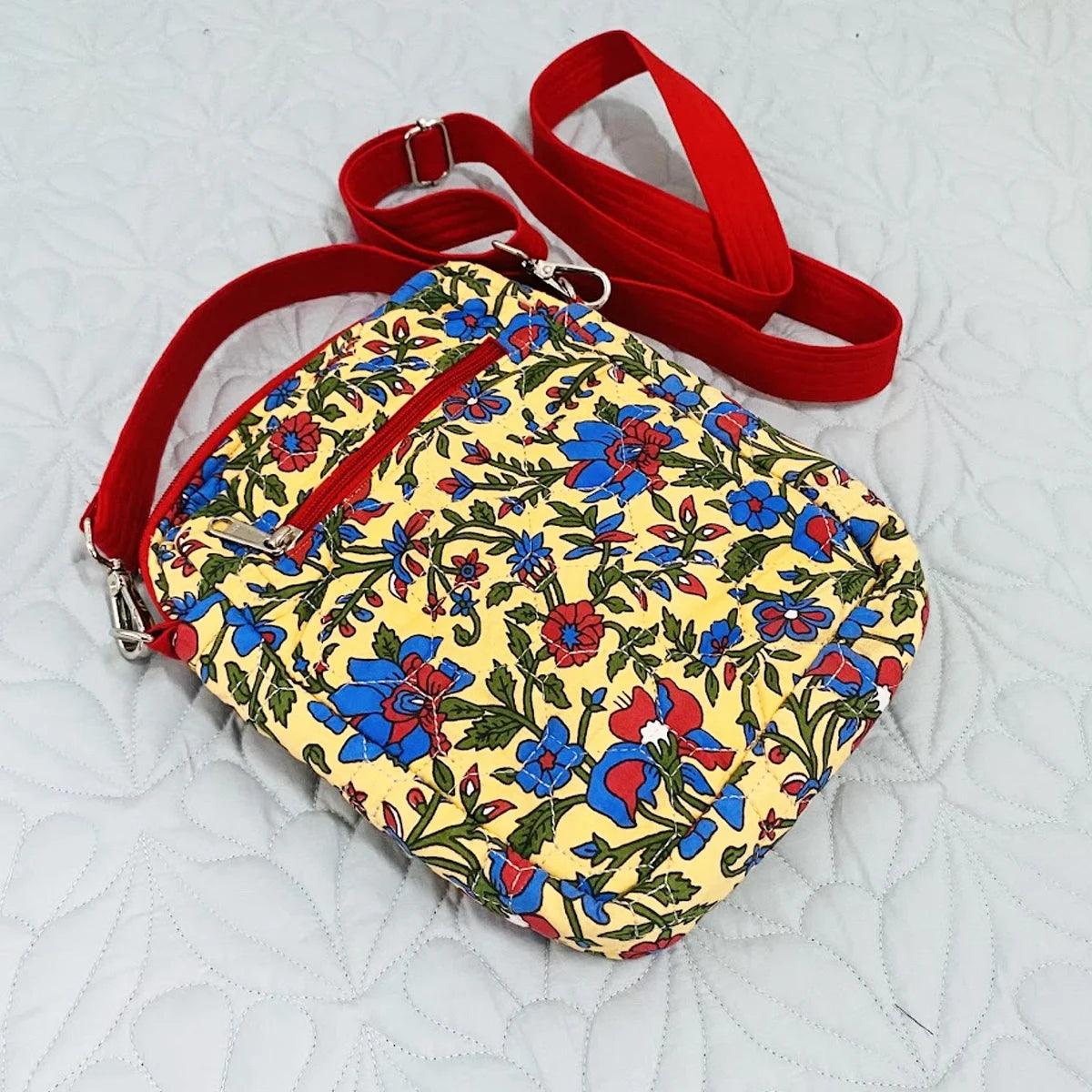 Freesia Sling: Vertical Quilted Sling Bag: Red Blue Green Flowers on Yellow